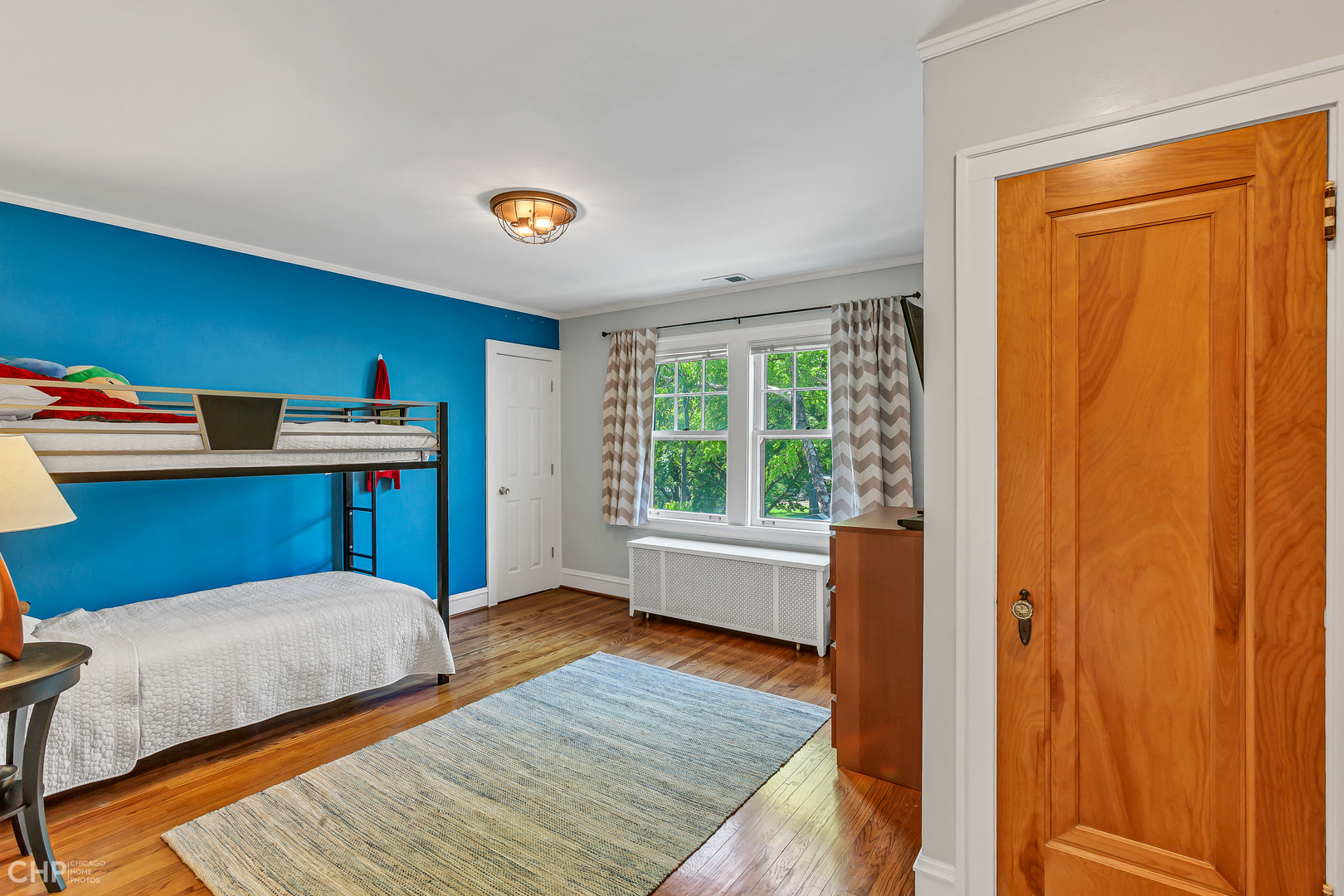 297 Scottswood Road Riverside, IL 60546 - Photo 20 of 29 a bedroom with a bed and a window