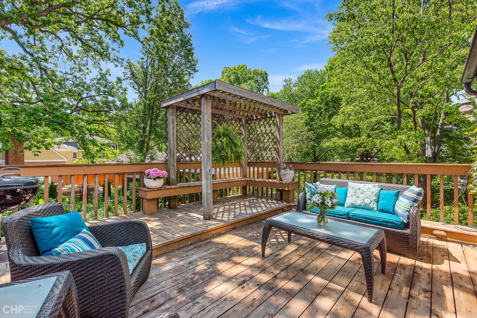 297 Scottswood Road Riverside, IL 60546 - Photo 26 of 29 an outdoor sitting area with furniture and wooden fence