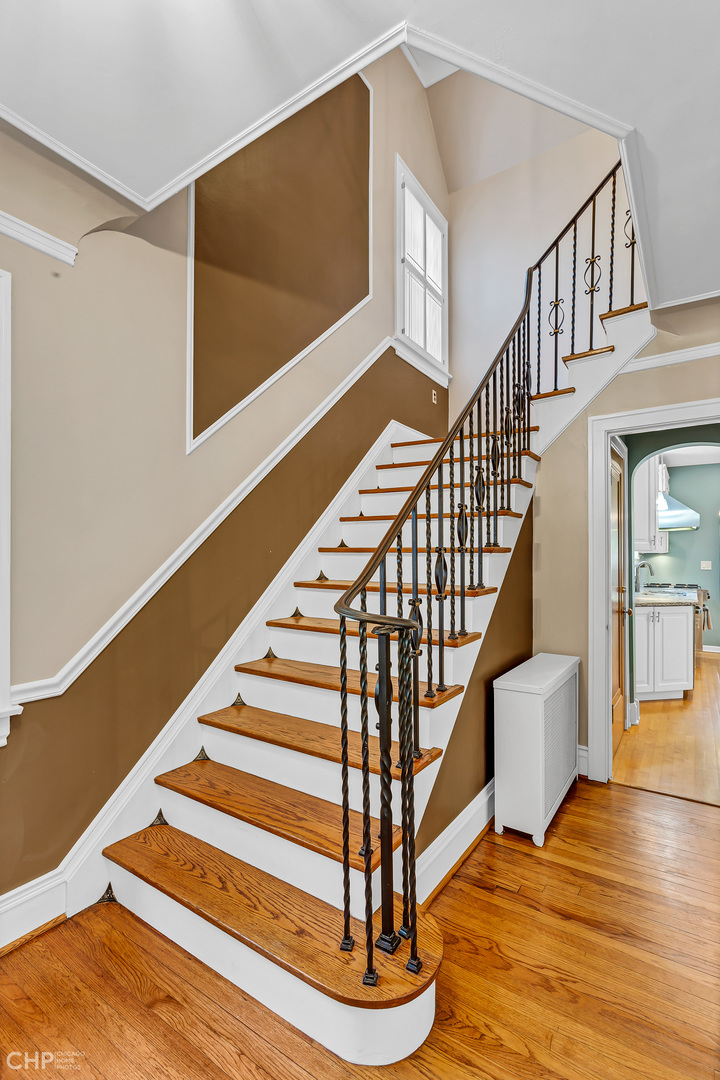 297 Scottswood Road Riverside, IL 60546 - Photo 5 of 29 a view of entryway and hall with wooden floor