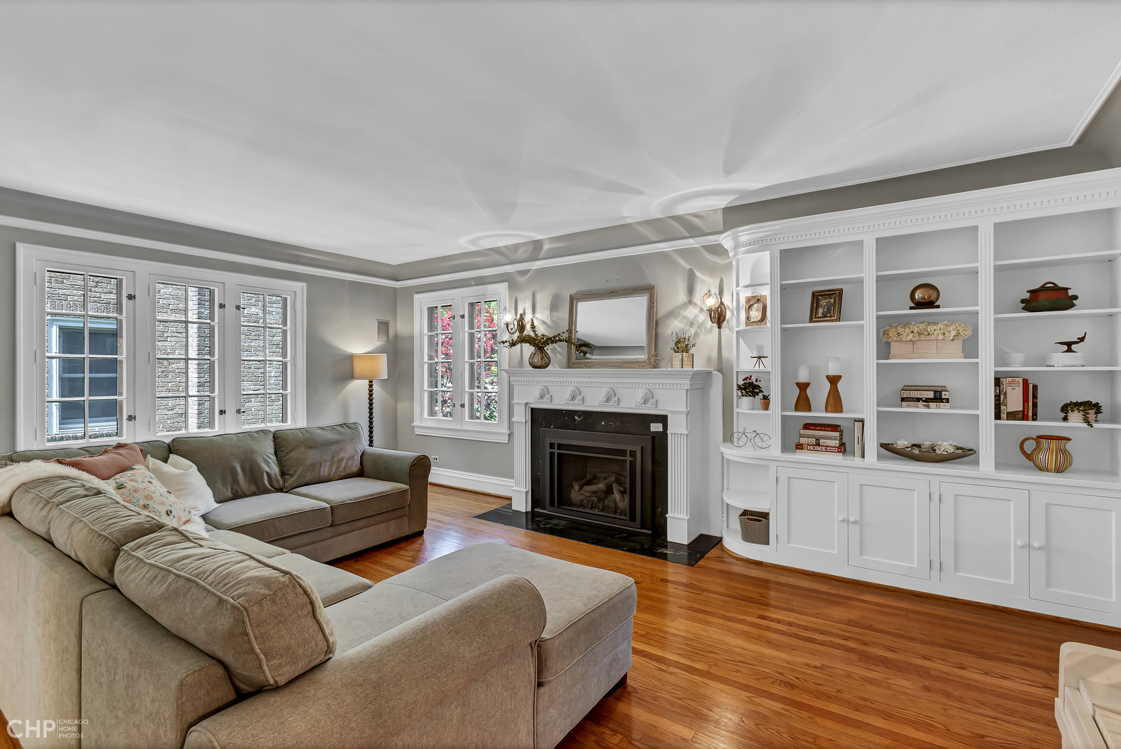 297 Scottswood Road Riverside, IL 60546 - Photo 7 of 29 a living room with furniture and a fireplace