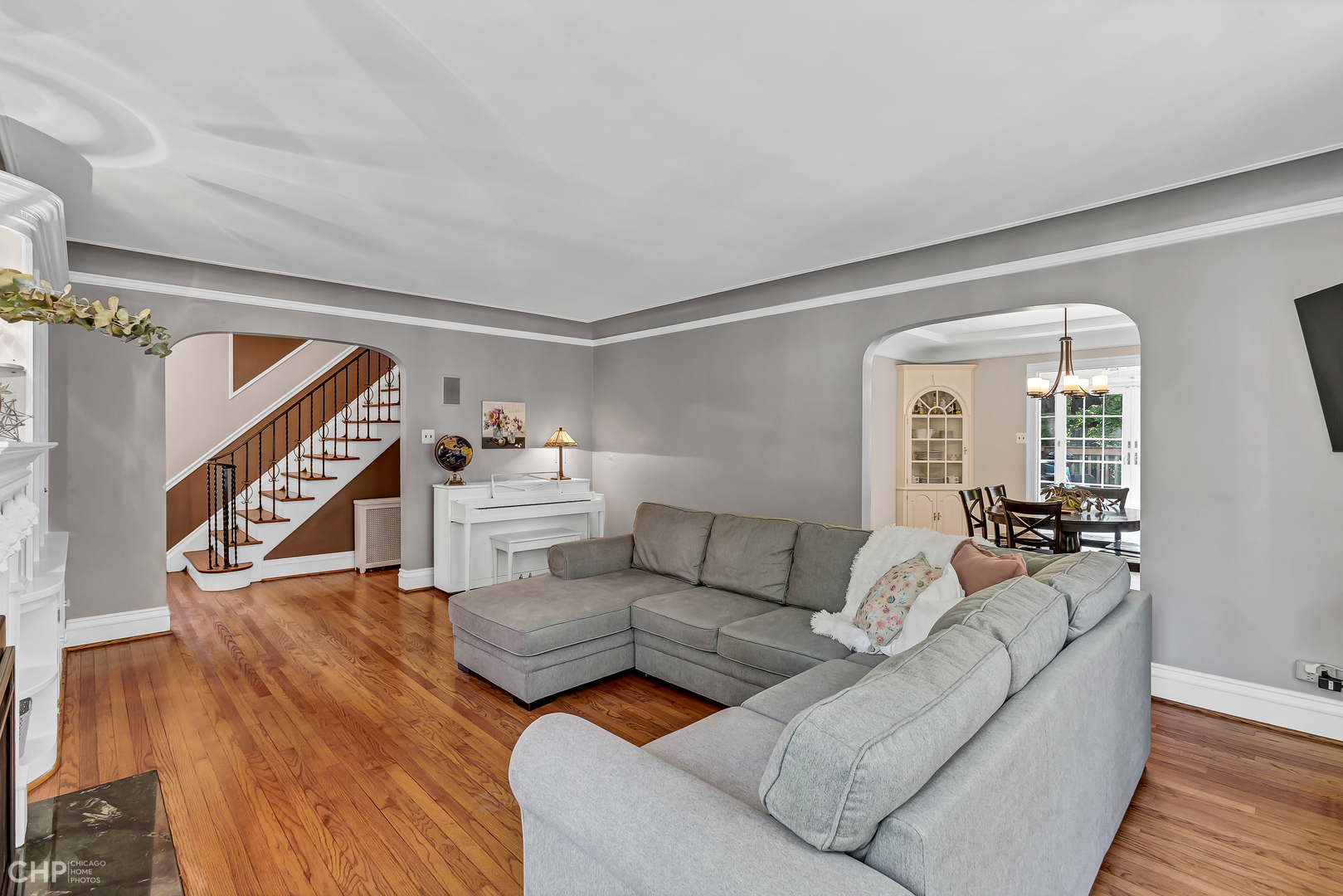297 Scottswood Road Riverside, IL 60546 - Photo 8 of 29 a living room with furniture and a fireplace