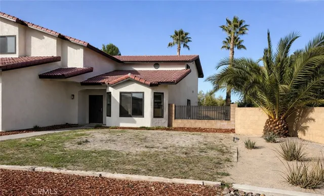 a view of a house with a patio