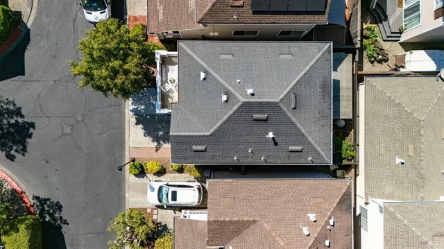 an aerial view of a house with a garden