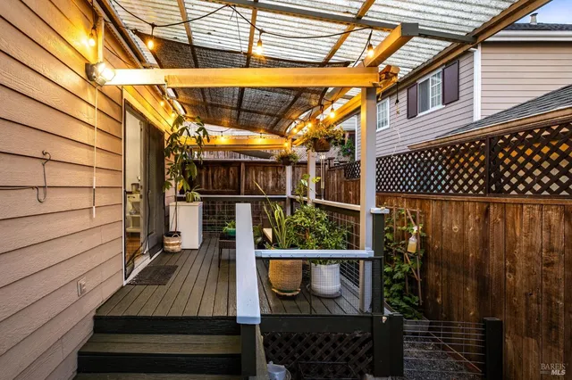 a view of balcony with wooden floor