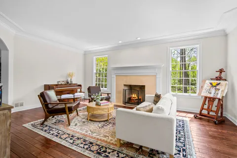 a living room with furniture and window