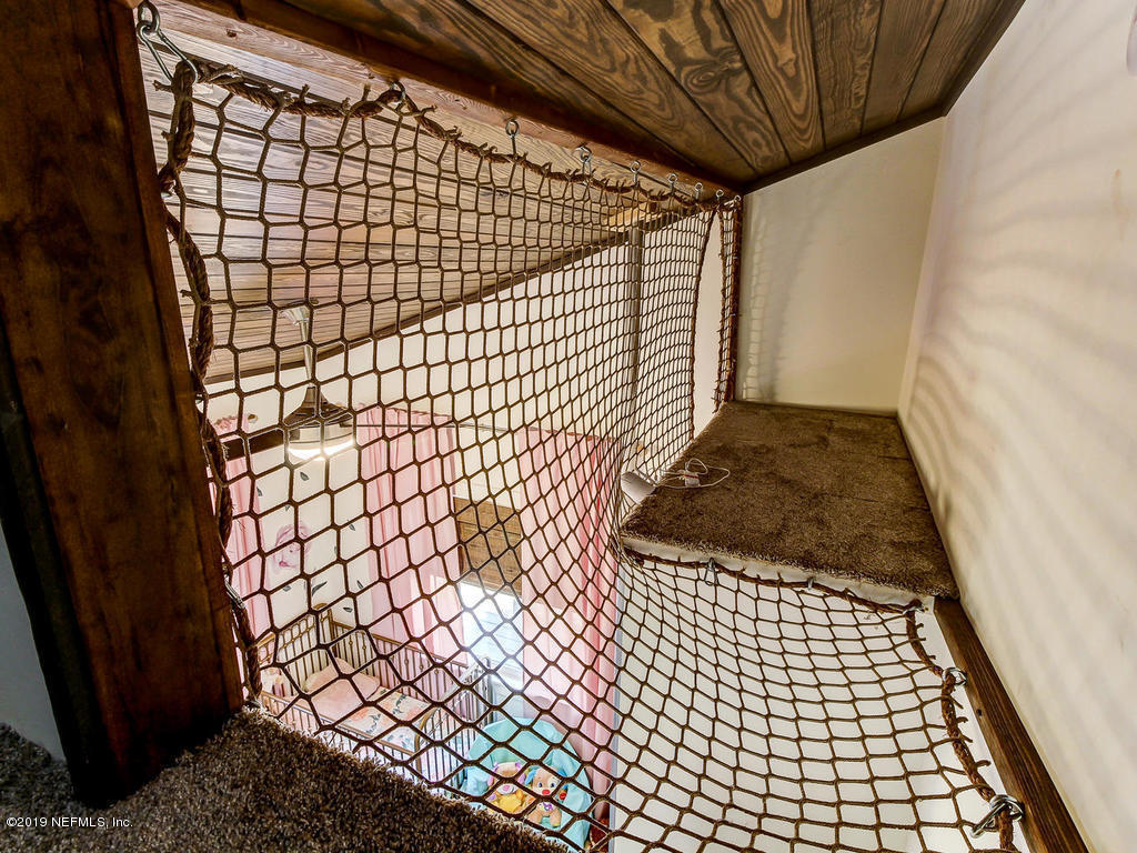 54058 Lawhon Road South Callahan, FL 32011 - Photo 33 of 55 a bathroom with a shower