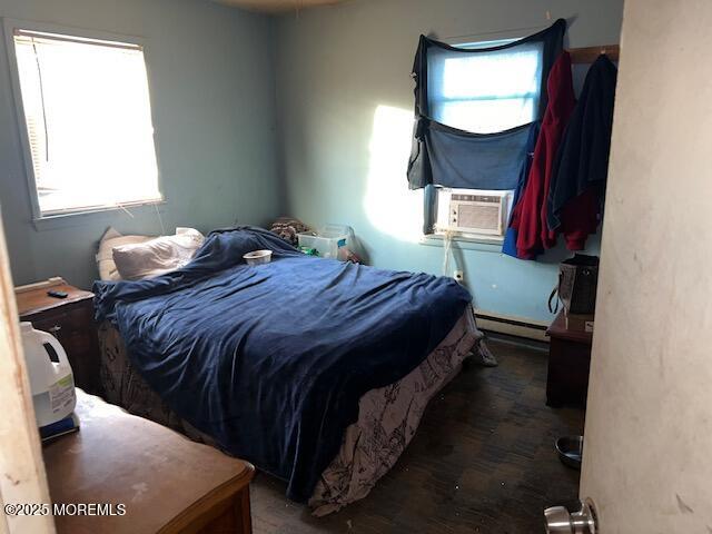 536 Devon Street Forked River, NJ 08731 - Photo 8 of 11 a bed sitting in a bedroom next to a window