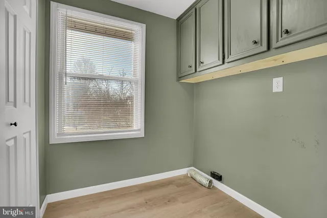 a view of a room that has a window