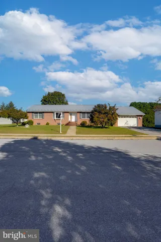 a view of a swimming pool with an ocean view