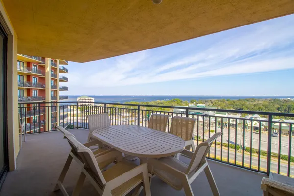 a view of a balcony with a lounge chair