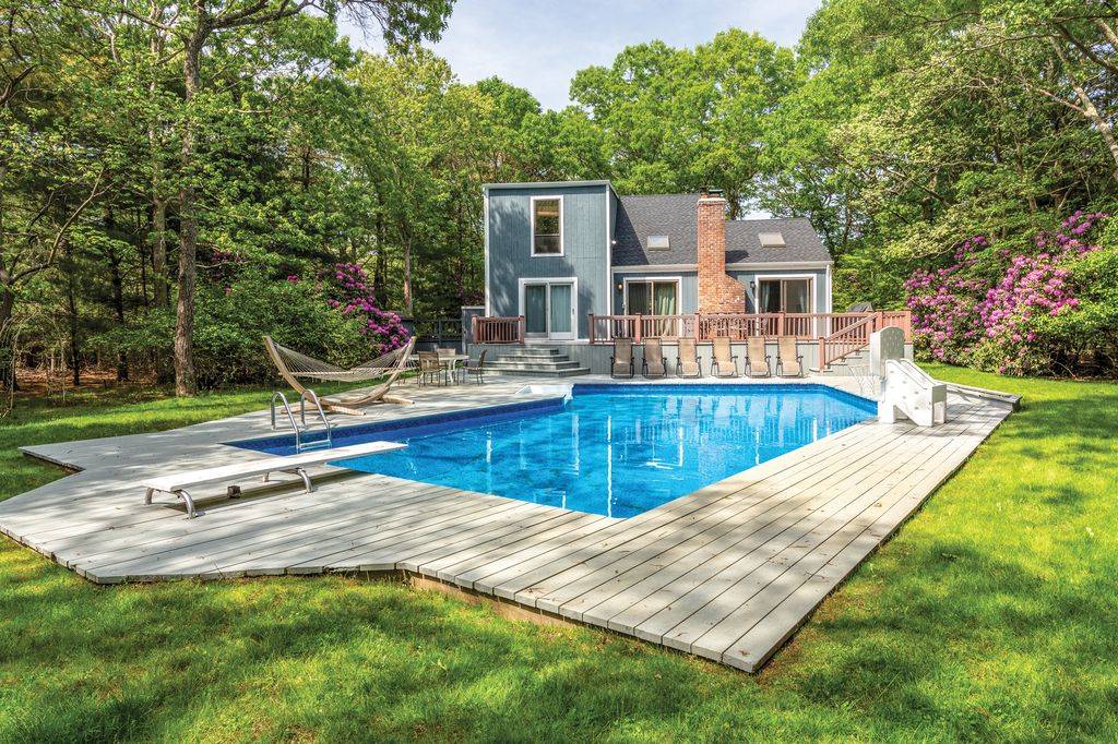 4 Renees Way East Hampton, NY 11937 - Photo 15 of 16 a view of a house with a swimming pool