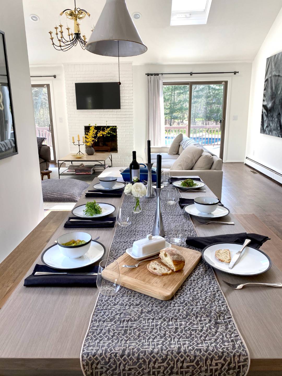 4 Renees Way East Hampton, NY 11937 - Photo 4 of 16 a living room with furniture a flat screen tv and a table