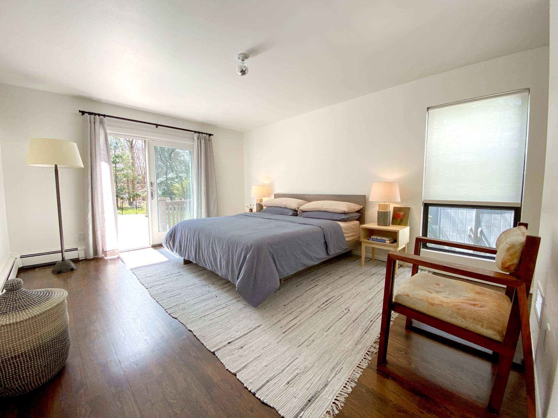 4 Renees Way East Hampton, NY 11937 - Photo 6 of 16 a bedroom with a bed a couch and a dresser next to a window