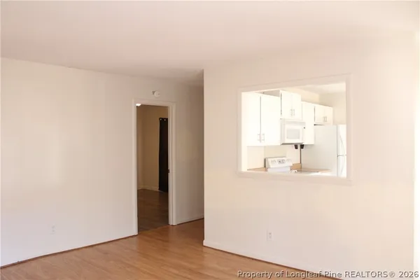 a view of a room that has a window in it