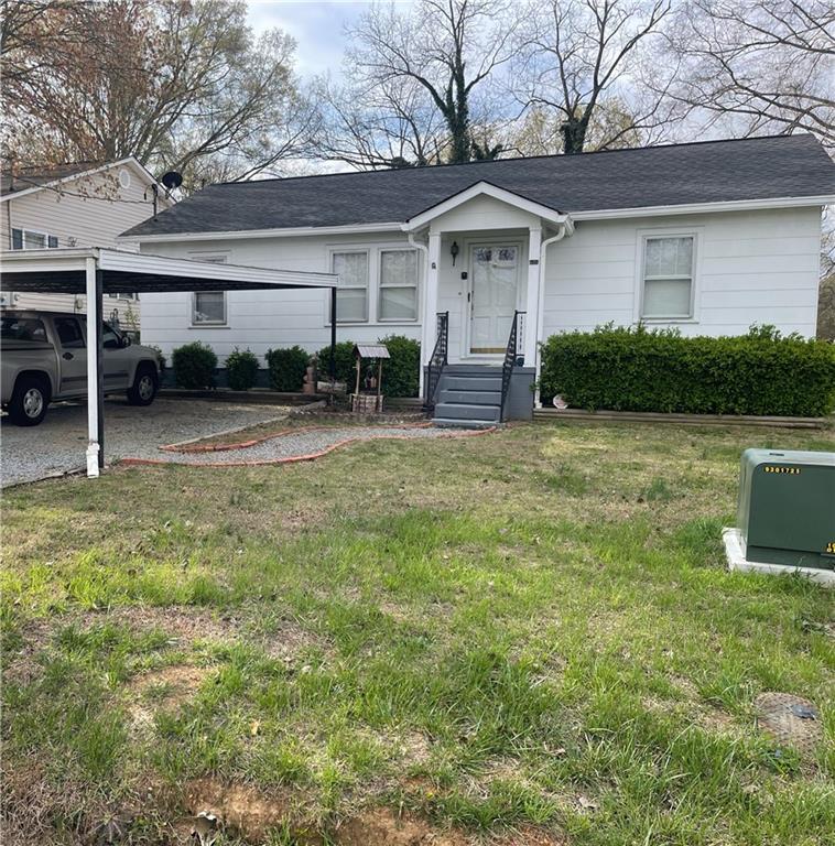 24 Lombardy Way Southeast Rome, GA 30161 - Photo 1 of 1 a view of a house with a yard