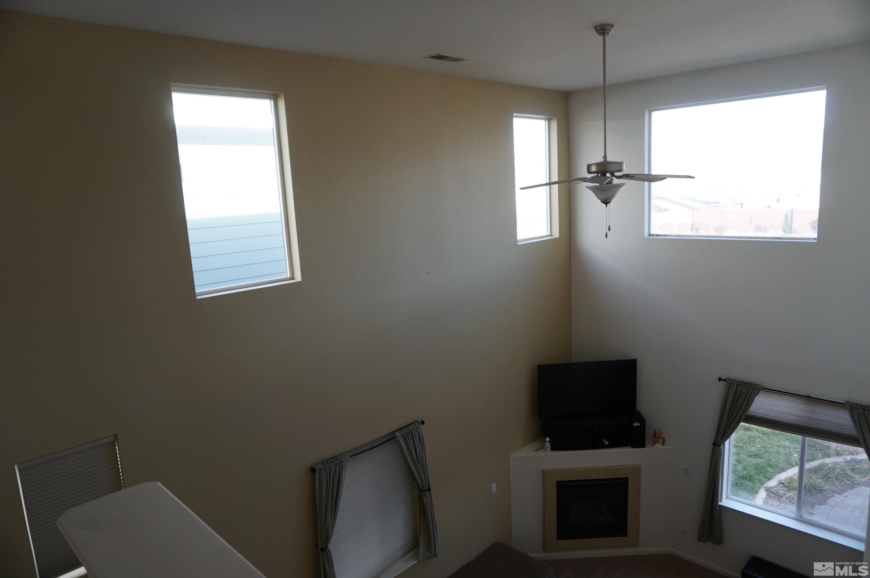 2120 Hellaby Lane Reno, NV 89502 - Photo 14 of 21 a view of a room with window and hardwood floor