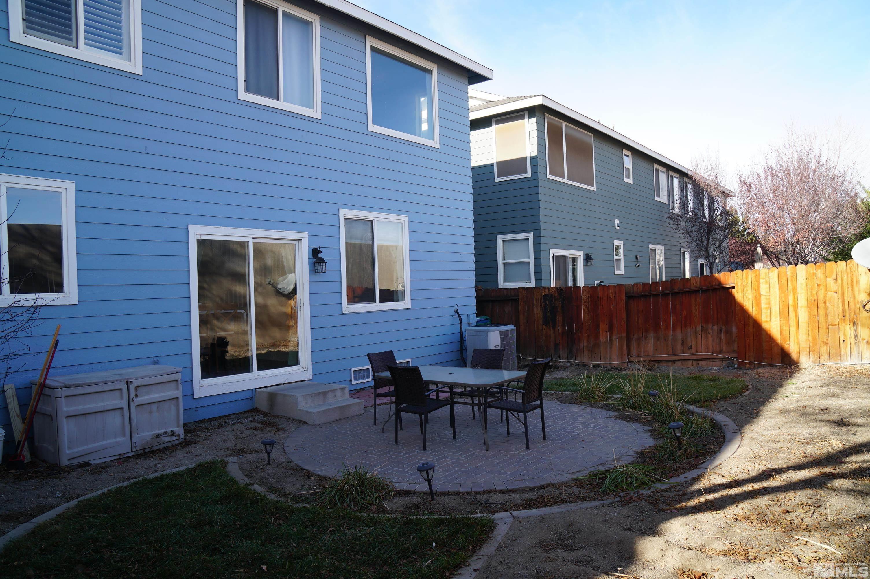 2120 Hellaby Lane Reno, NV 89502 - Photo 3 of 21 a view of a house with backyard and sitting area