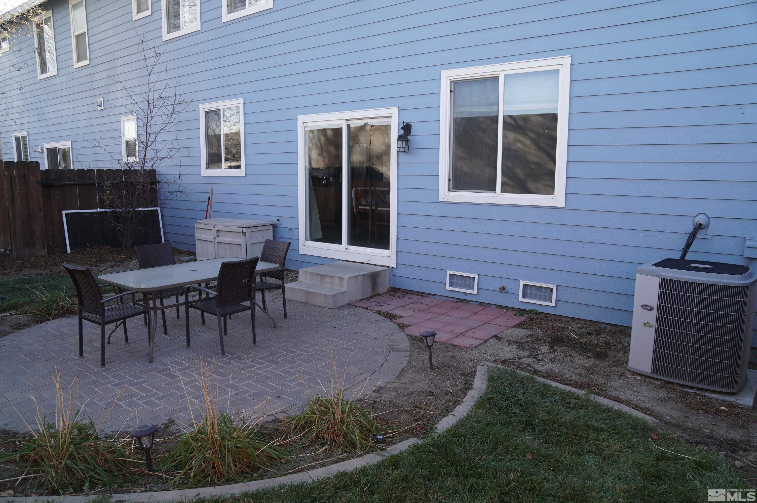 2120 Hellaby Lane Reno, NV 89502 - Photo 4 of 21 a view of a house with backyard and sitting area