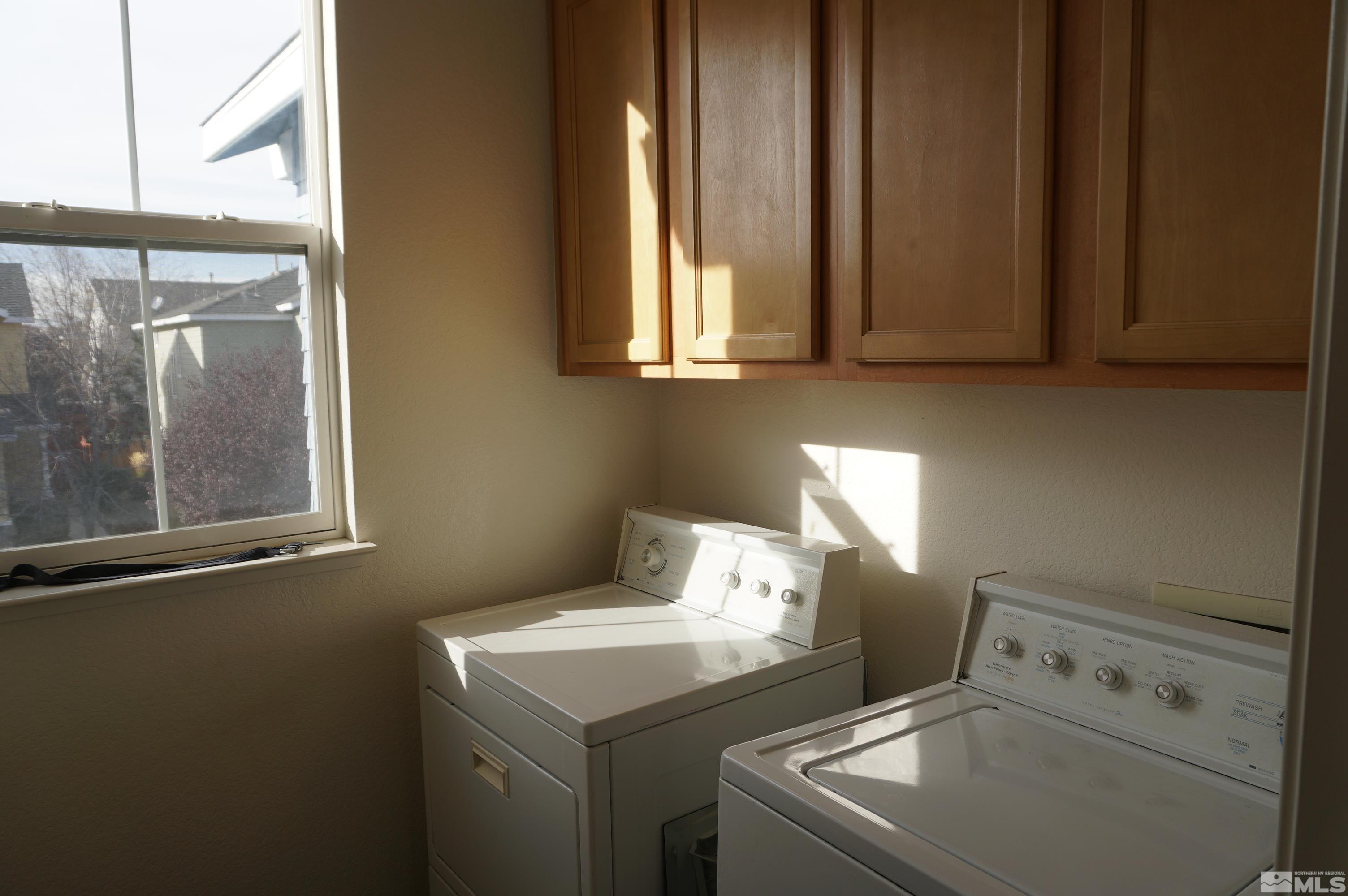 2120 Hellaby Lane Reno, NV 89502 - Photo 5 of 21 a utility room with dryer and washer