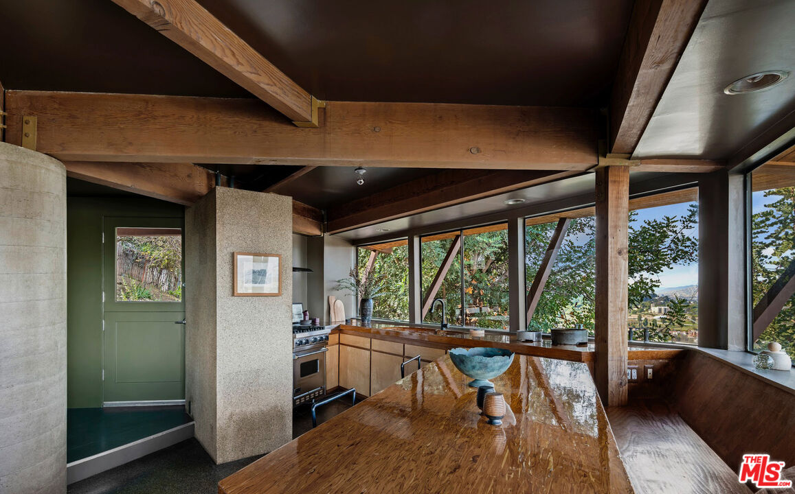 2538 Sundown Drive Los Angeles, CA 90065 - Photo 12 of 27 a view of a room with lounge chair and windows