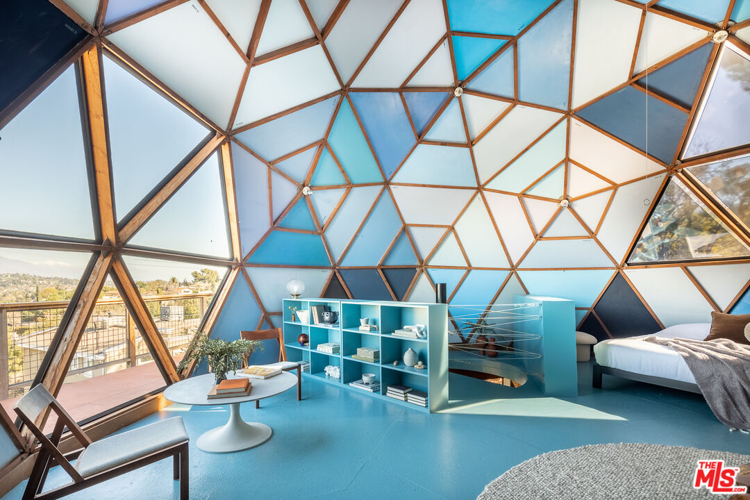 2538 Sundown Drive Los Angeles, CA 90065 - Photo 19 of 27 a living room with a couch and a table