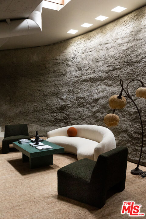 2538 Sundown Drive Los Angeles, CA 90065 - Photo 5 of 27 a living room with patio furniture and a fireplace