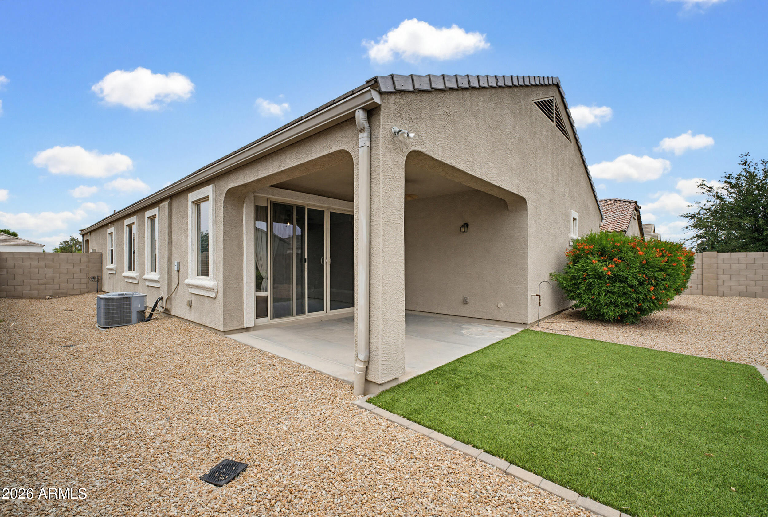 19995 North Ben Court Maricopa, AZ 85138 - Photo 41 of 51 a front view of a house with a yard and garage