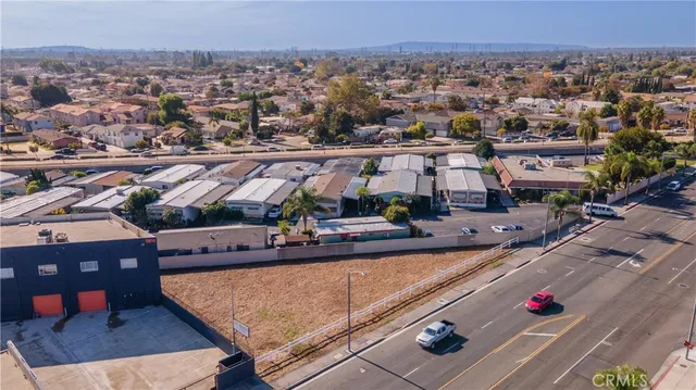 an aerial view of multiple houses with a terrace