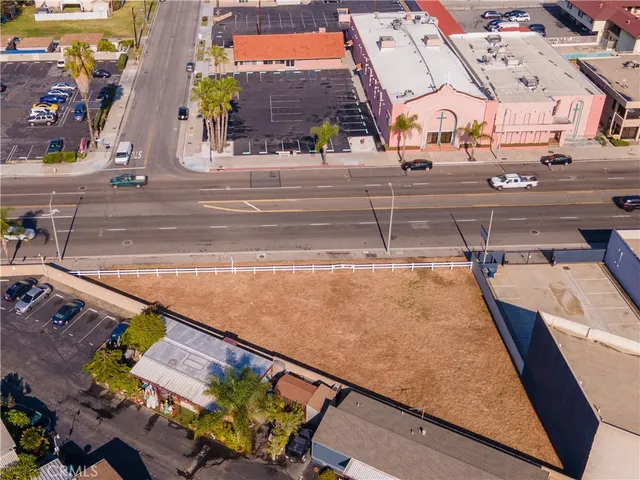 an aerial view of a tennis ground with large trees