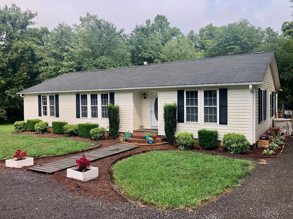 340 Ridge Road Mocksville, NC 27028 - Photo 1 of 22 a view of a house with a yard