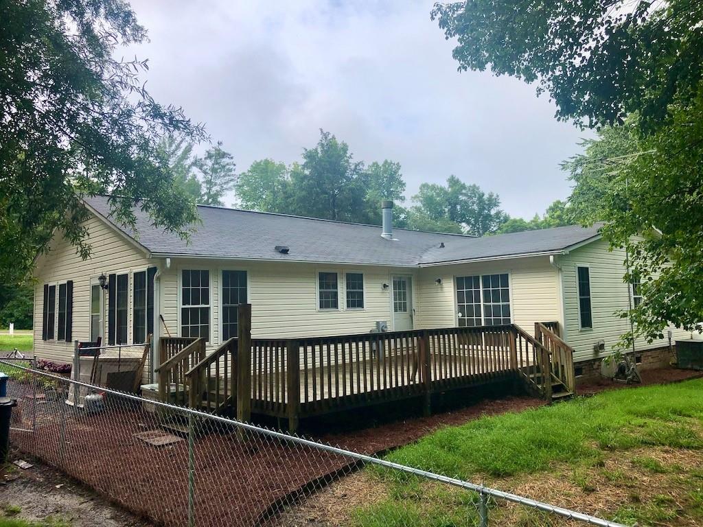 340 Ridge Road Mocksville, NC 27028 - Photo 2 of 22 a view of a house with a backyard and a deck