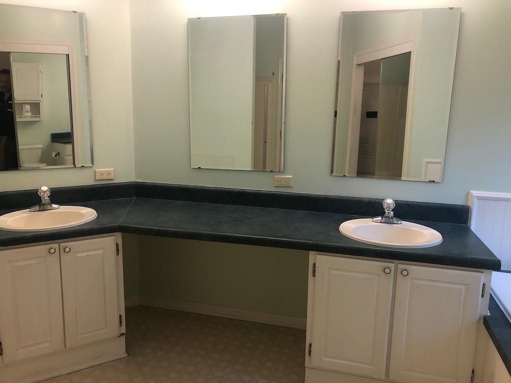 340 Ridge Road Mocksville, NC 27028 - Photo 18 of 22 a bathroom with a sink and a mirror