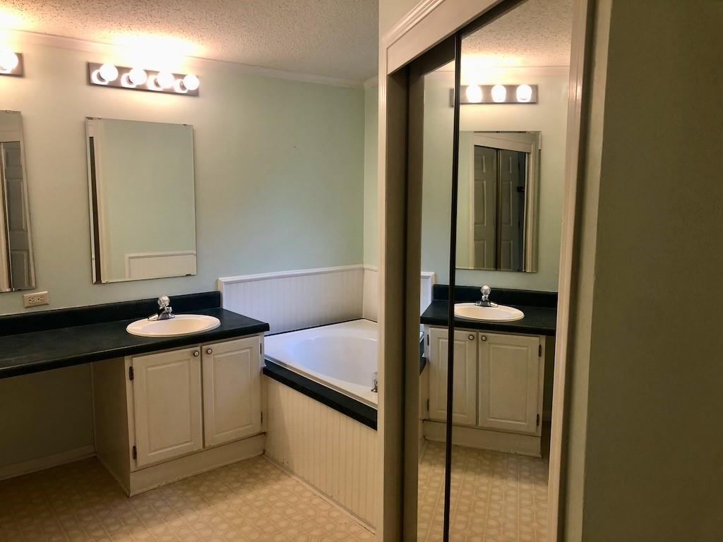 340 Ridge Road Mocksville, NC 27028 - Photo 20 of 22 a bathroom with a sink and a mirror