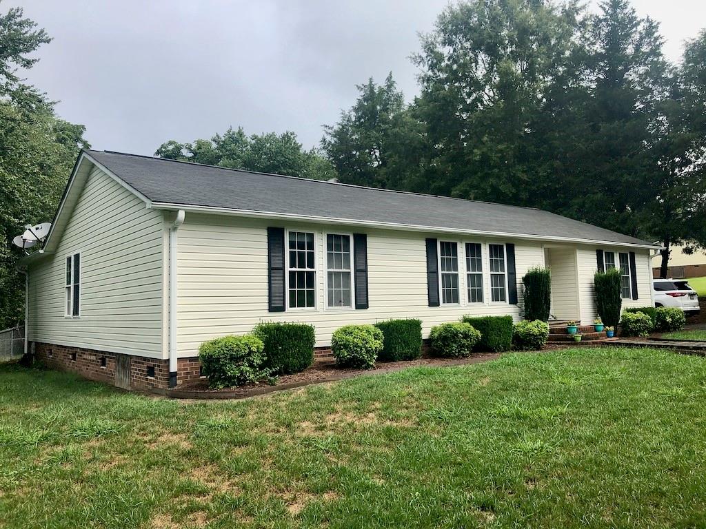 340 Ridge Road Mocksville, NC 27028 - Photo 3 of 22 a view of a house with a backyard