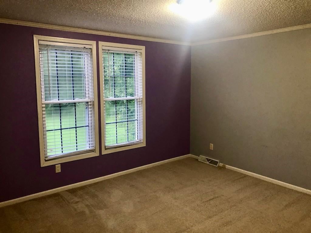 340 Ridge Road Mocksville, NC 27028 - Photo 22 of 22 an empty room with a window