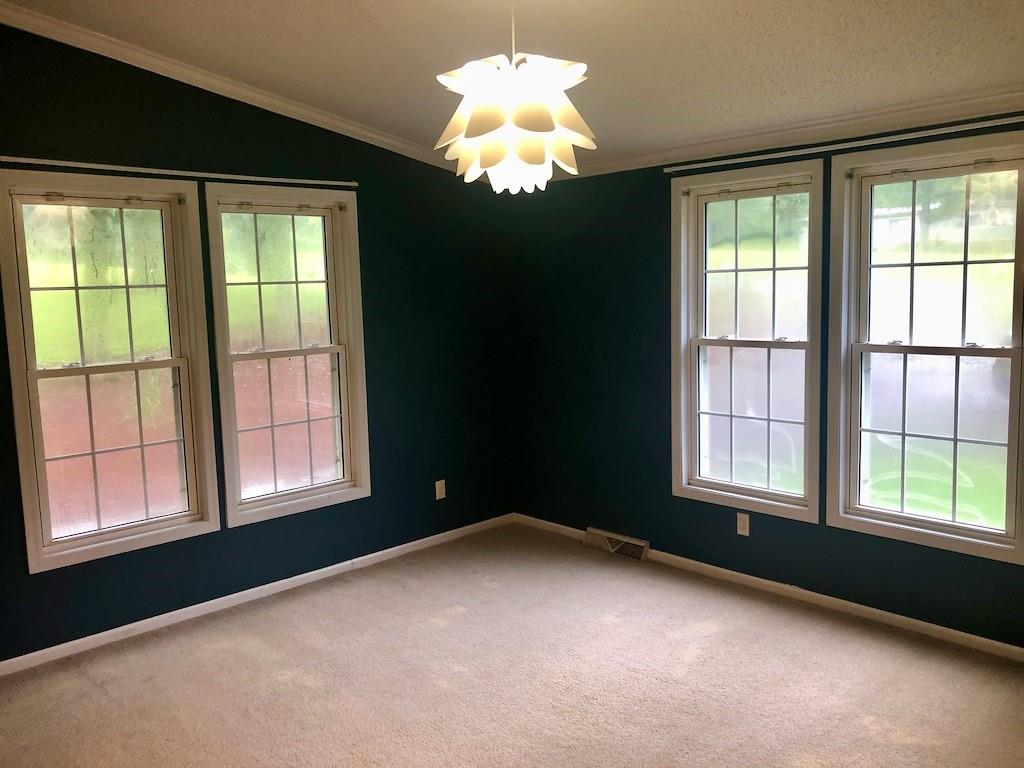 340 Ridge Road Mocksville, NC 27028 - Photo 5 of 22 a view of a windows and chandelier in a room