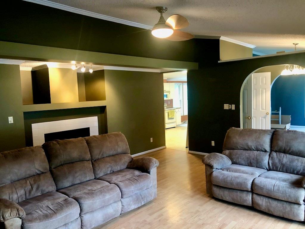 340 Ridge Road Mocksville, NC 27028 - Photo 8 of 22 a living room with furniture and a fireplace