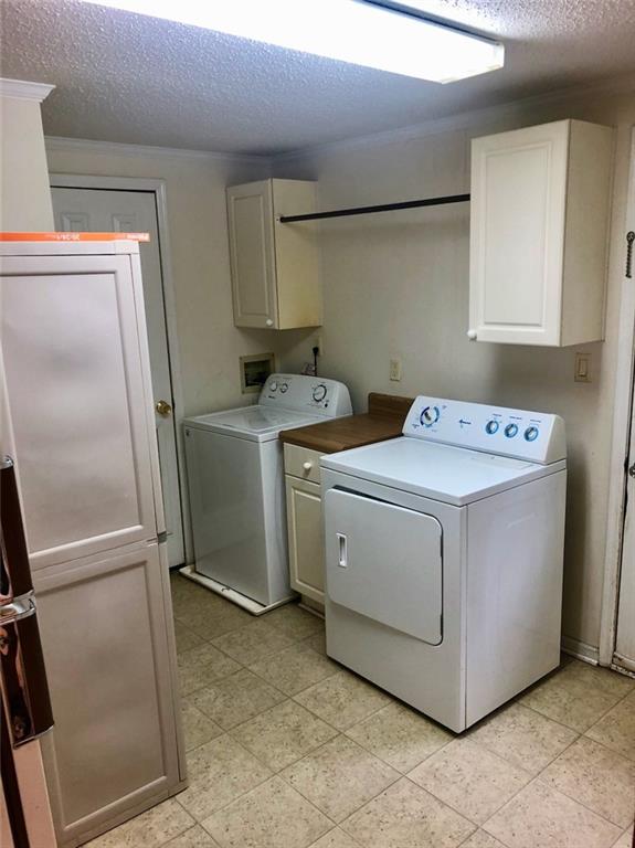 340 Ridge Road Mocksville, NC 27028 - Photo 9 of 22 a utility room with dryer and washer