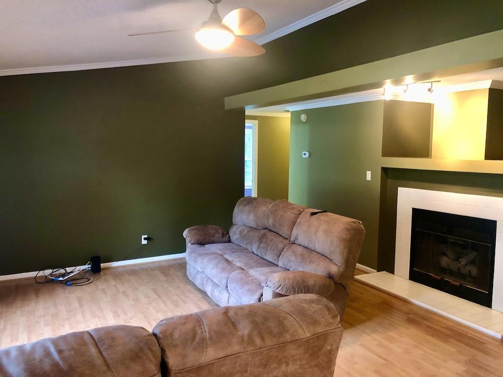 340 Ridge Road Mocksville, NC 27028 - Photo 10 of 22 a bedroom with a bed and a fireplace