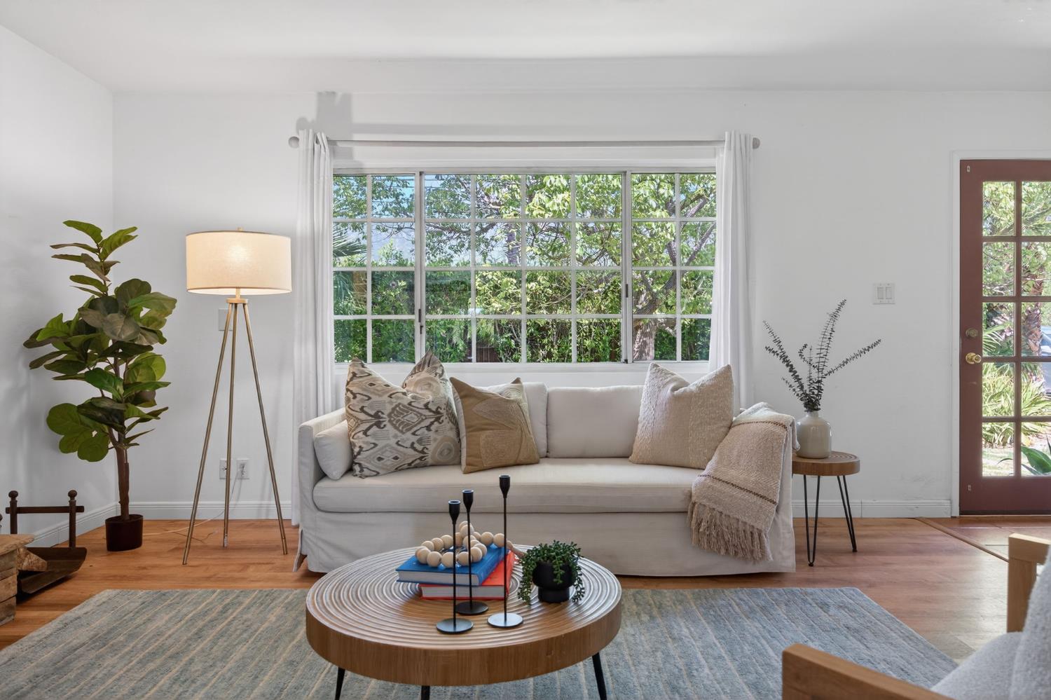 1054 Fairview Road Ojai, CA 93023 - Photo 12 of 33 a living room with furniture and a large window