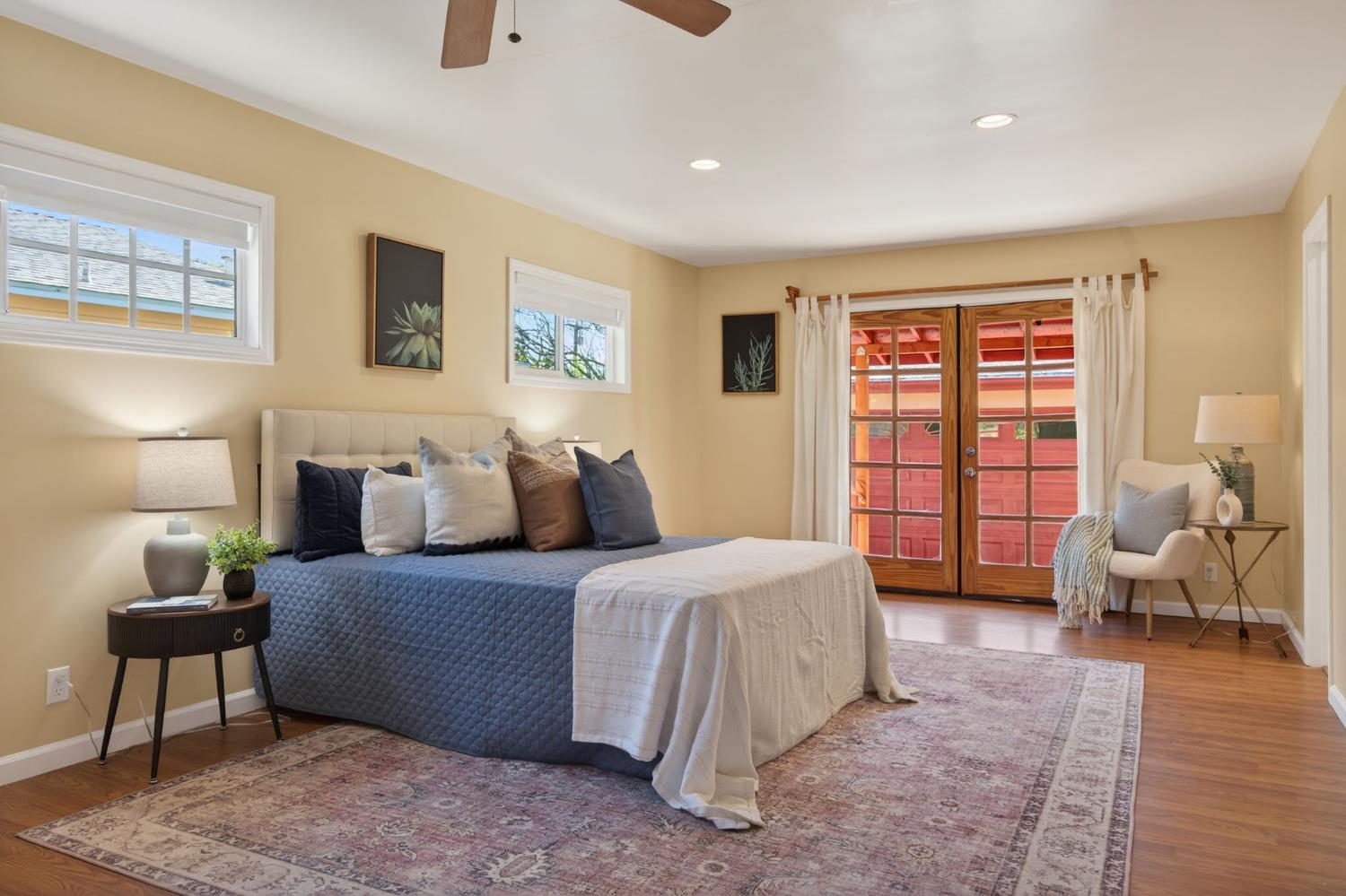 1054 Fairview Road Ojai, CA 93023 - Photo 22 of 33 a bedroom with a bed and wooden floor