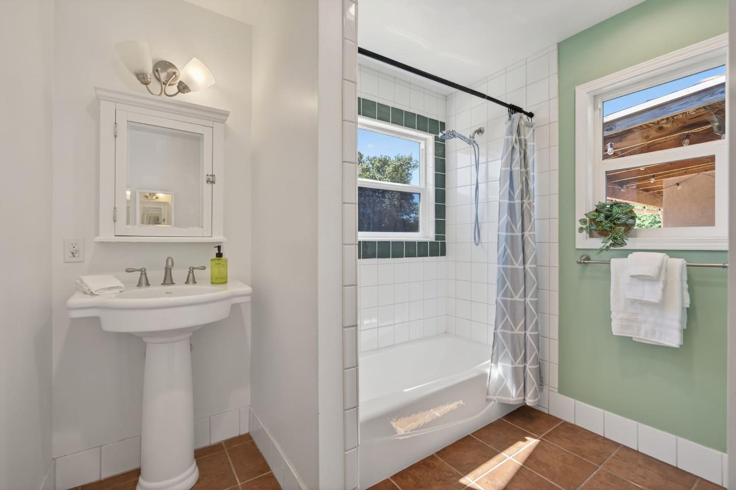 1054 Fairview Road Ojai, CA 93023 - Photo 24 of 33 a bathroom with a sink and mirror