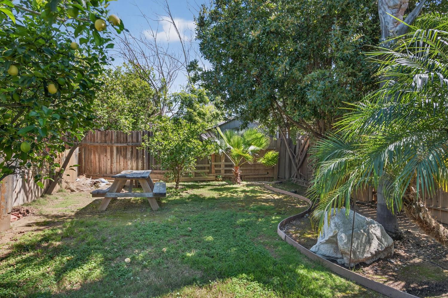 1054 Fairview Road Ojai, CA 93023 - Photo 4 of 33 a view of a chair and table in backyard of the house
