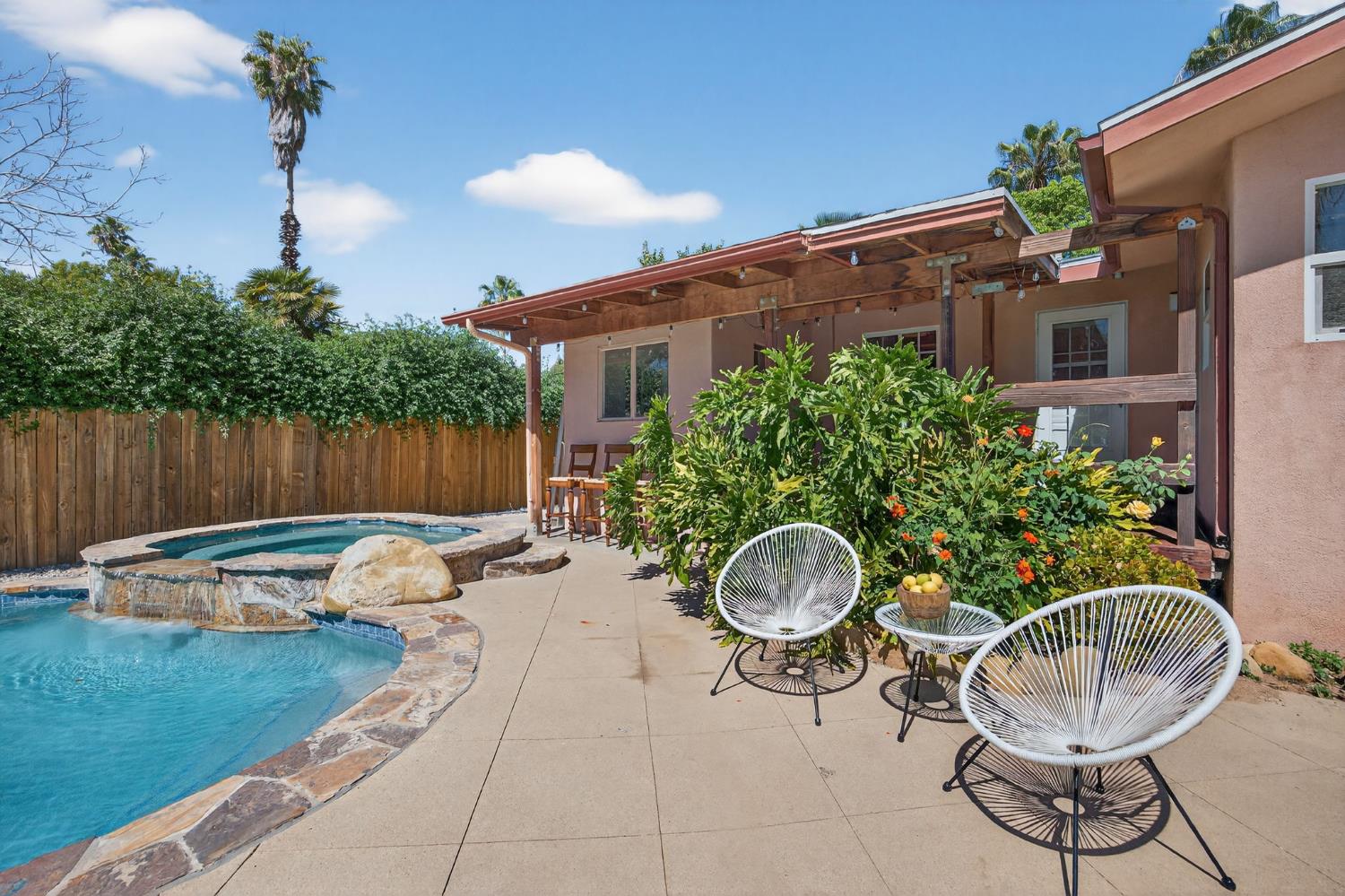 1054 Fairview Road Ojai, CA 93023 - Photo 6 of 33 a backyard of a house with table and chairs