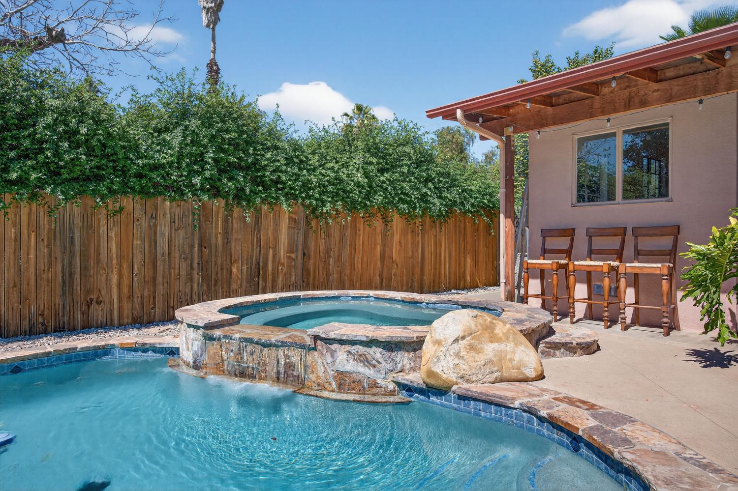 1054 Fairview Road Ojai, CA 93023 - Photo 7 of 33 a backyard of a house with table and chairs