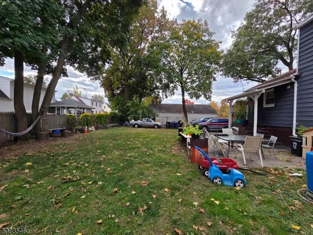 a view of outdoor space with garden and patio