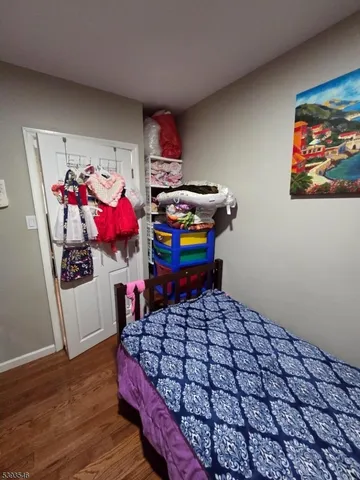 a living room with furniture window and a flat screen tv