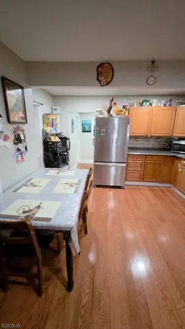 a kitchen with stainless steel appliances granite countertop a stove and a sink