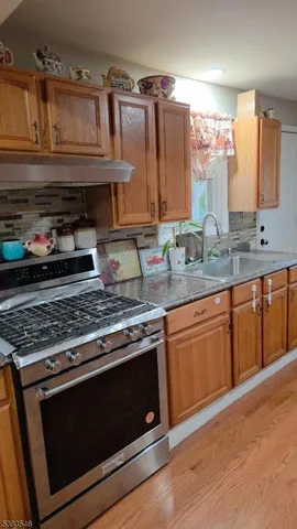 a room with furniture and a flat screen tv