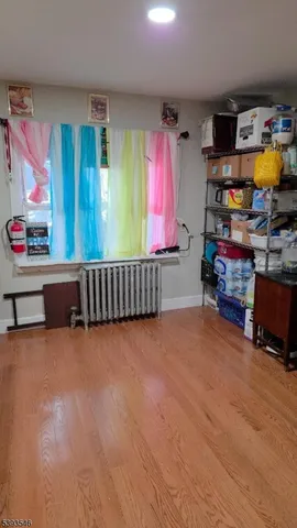 a view of entryway and kitchen